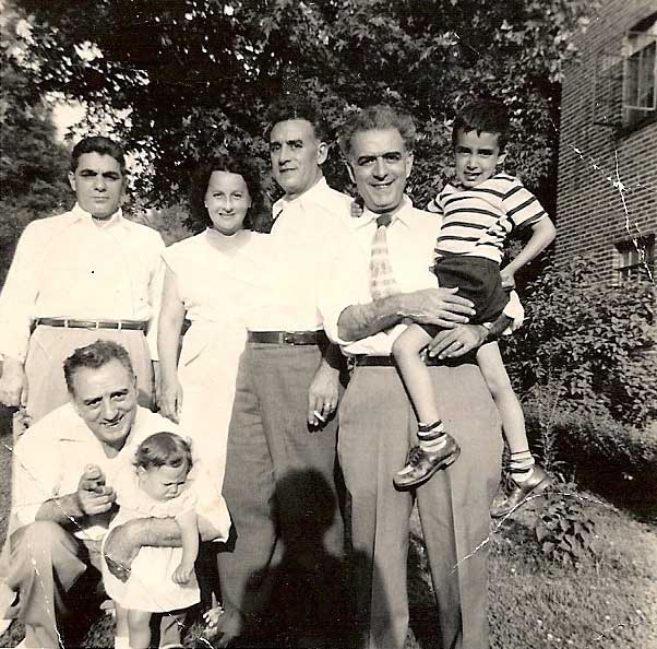 Franco Di Cierio, the couple Carmelita and Giuseppe Stávale, Giacomo Stávale holding his son James and Luigi Stávale crouching holding Elyse (1951)
